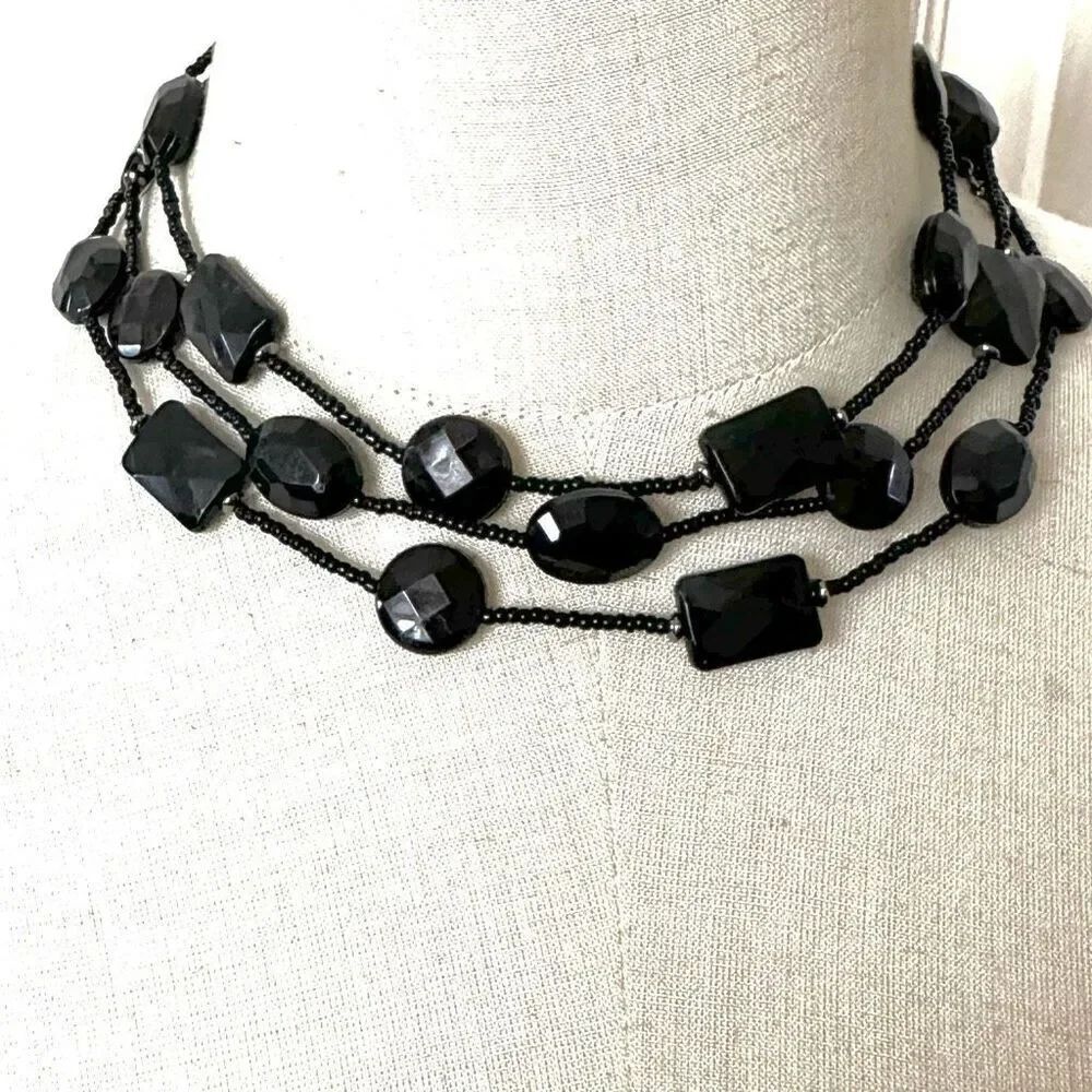 Black beaded triple strand necklace